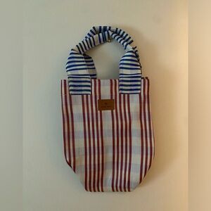 Gunes swim tote in red, blue and white.